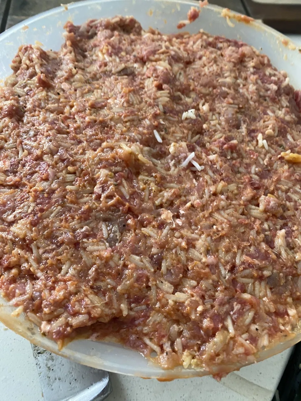 Mixing rice and meat